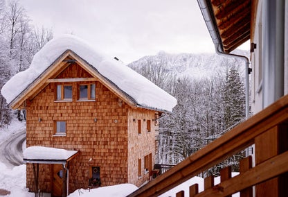 Snowy roofs on a large home outside of Park City, Utah.