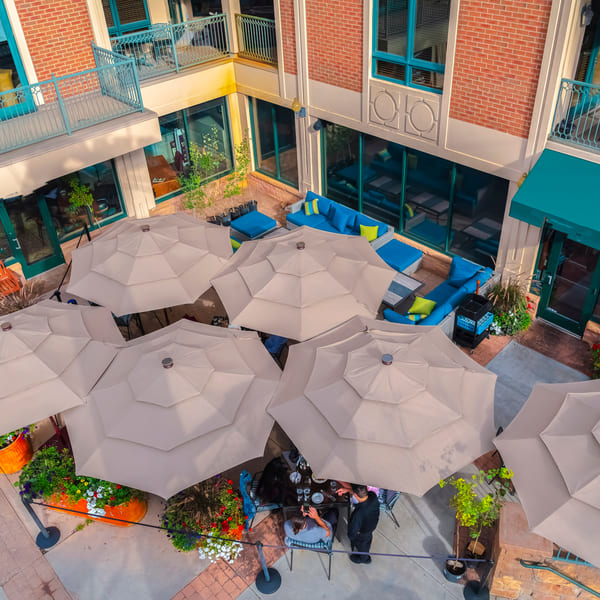 aerial footage of Park City, Utah cafe downtown with umbrellas.