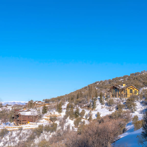 Snowy homes along the mountain near Jordanelle, Park City, UT.